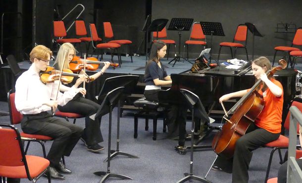 string players practising