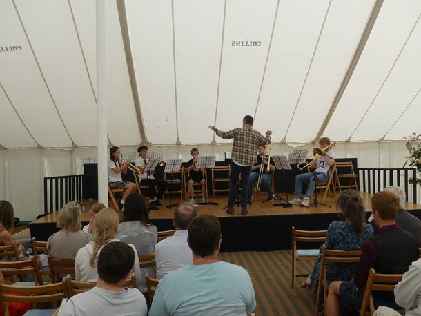 A  brass band in a tent