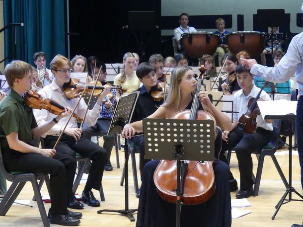 The music academy performing as an orchestra