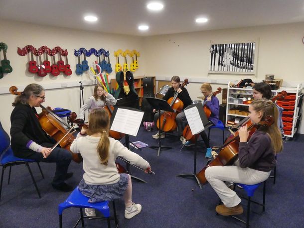 Cello player practising in a circle
