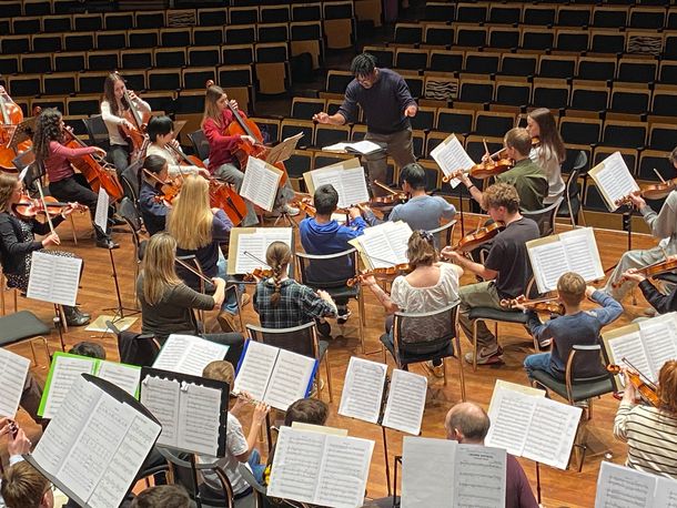 Orchestra practicing for the performance