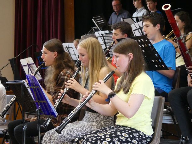 A group of clarinet players rehearsing.